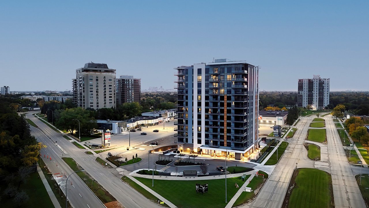 A wide shot of the Atelier/Tuxedo Residences tower