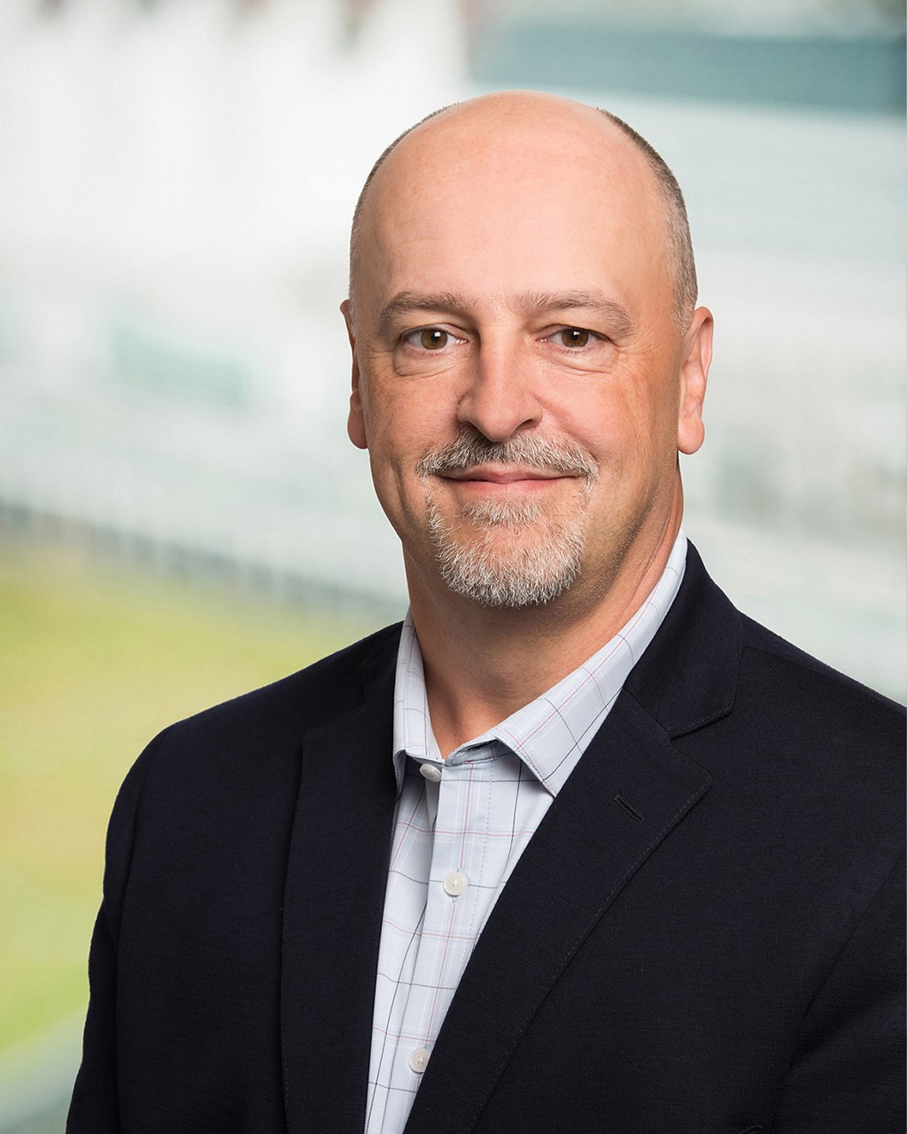 A portrait of John Kump, Ledcor CFO